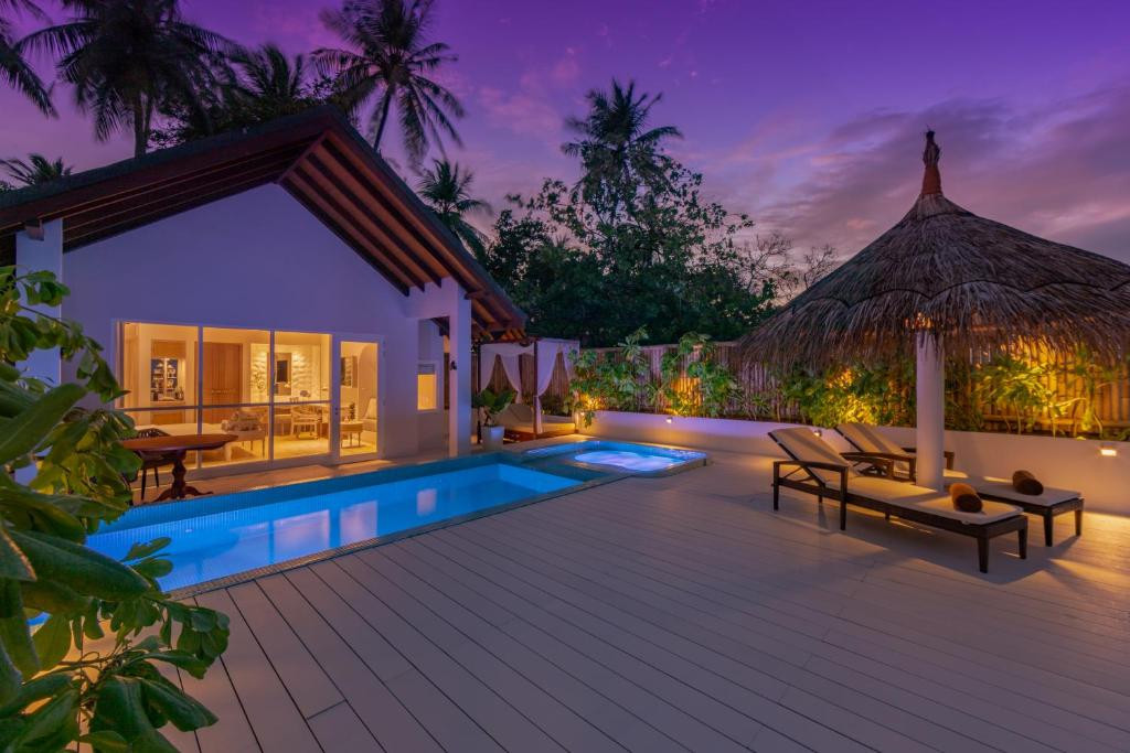 Malahini Kuda Bandos Resort на Мальдивах